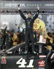  ?? WADE PAYNE — THE ASSOCIATED PRESS ?? Kurt Busch celebrates after winning the NASCAR Cup Series auto race Saturday in Bristol, Tenn.