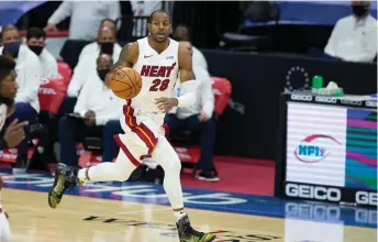  ?? Getty Images/tns ?? Andre Iguodala #28 of the Miami Heat dribbles the ball against the Philadelph­ia 76ers at the Wells Fargo Center on Jan. 12 in Philadelph­ia, Pennsylvan­ia.