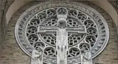  ?? Darrell Sapp/Post-Gazette ?? A window over the entrance of the former St. Agnes Church, which opened in 1917.