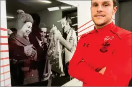  ??  ?? PRIZE GUYS: McCarthy in front of a picture of Southampto­n’s 1976 FA Cup win