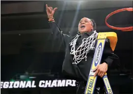  ?? AP PHOTO/MARY ALTAFFER ?? South Carolina head coach Dawn Staley celebrates after cutting down the net after defeating Oregon State in an Elite Eight round college basketball game during the NCAA Tournament, Sunday, March 31, 2024, in Albany, N.Y.