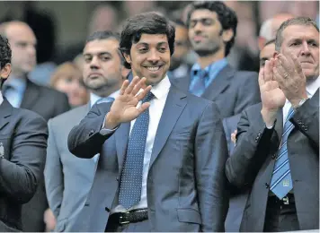  ?? Photo: Zimbio ?? Manchester City owner Sheikh Mansour waves to the crowd while attending one of the English Premier League matches in London.