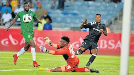  ?? Picture: GALLO IMAGES ?? CLOSE WATCH: Orlando Pirates striker Thamsanqa Gabuza’s, right, shot is being saved by AmaZulu goalkeeper Boalefa Pule, centre, during their league match at Orlando Stadium in Johannesbu­rg on Saturday