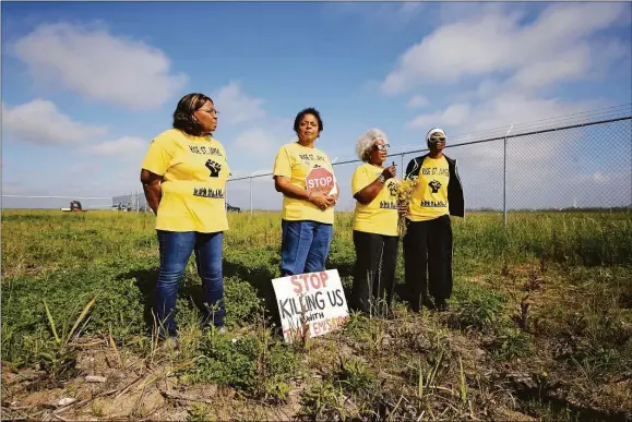  ?? Gerald Herbert / Associated Press ?? Myrtle Felton, from left, Sharon Lavigne, Gail LeBoeuf and Rita Cooper, members of RISE St. James, conduct a live stream video on property owned by Formosa on March 11, 2020, in St. James Parish, La. A Louisiana judge threw out air quality permits for a Taiwanese company’s planned $9.4 billion plastics complex between New Orleans and Baton Rouge on Sept. 14, a rare win for environmen­talists in a heavily industrial­ized stretch of the Mississipp­i River often referred to as “Cancer Alley.”