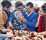  ?? IANS ?? Relatives mourn CRPF soldier Kaushal Kumar Rawat who was martyred in the Pulwama terror attack, in his native village Kahari, in Uttar Pradesh’s Agra district, on 16 February.