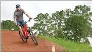  ?? John Bailey ?? Kingston Downs co-founder Stan Bouckaert rides down some of the purpose-built mountain bike trails on the property.