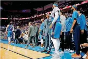  ??  ?? Thunder assistant coach Maurice Cheeks talks to Carmelo Anthony on the sideline during Game 5 of the first-round playoff series against Utah. Anthony made it clear in his exit interview on Saturday that he does not want to play a bench role next season.