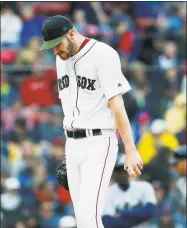  ?? Michael Dwyer / Associated Press ?? Boston’s Chris Sale waits on the mound for a visit from Red Sox manager Alex Cora during the fifth inning on Sunday.