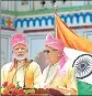  ?? PTI ?? PM Narendra Modi and his Nepal counterpar­t KP Oli during the inaugurati­on of JanakpurAy­odhya bus service on Friday