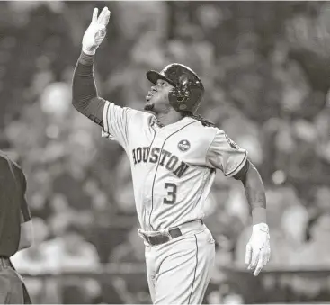  ?? Stephen Brashaer / Getty Images ?? The Astros’ Cameron Maybin celebrates his second game-winning hit in as many nights, a two-run homer.