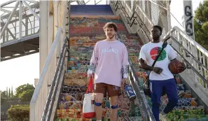  ?? (Parrish Lewis/20th Century Studios via AP) ?? This image released by 20th Century Studios shows Sinqua Walls as Kamal, right, and Jack Harlow as Jeremy in a scene from "White Men Can't Jump."