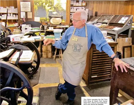  ?? (Marcia Schnedler/Special to the Democrat-Gazette) ?? Troy Odom operates the Old Time Print Shop at Ozark Folk Center State Park.