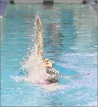  ?? Gregory Vasil / For Hearst Connecticu­t Media ?? Ridgefield’s Julia Weiner swims the backstroke leg of the 200-yard medley relay at the State Open on Saturday.