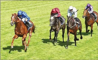  ?? (AFP) ?? Jockey William Buick rides Masar to victory for breeder Godolphin in the Derby on the second day of the Epsom
Derby Festival in Surrey, southern England on June 2.