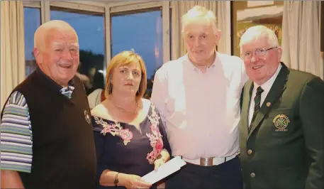  ??  ?? Prize-winners Terry Brennan and Seamus McParland with Captain Gene and Josephine O’Doherty of Readymixed Concrete Ireland (sponsors) at the Greenore Presentati­on Night.