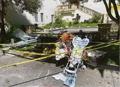  ?? David Hernandez/The Chronicle ?? A makeshift memorial honors the family of four killed in a March 16 crash at a bus stop near Muni’s West Portal Station.