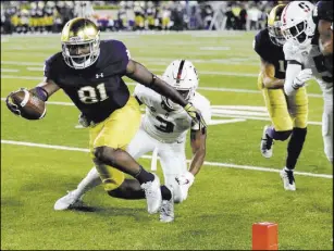  ?? Carlos Osorio The Associated Press ?? Notre Dame wide receiver Miles Boykin (81) beats Stanford safety Malik Antoine for a touchdown Saturday in South Bend, Ind.