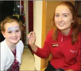  ??  ?? Olivia Harrington had her face painted by Staff member Nicola Collins.