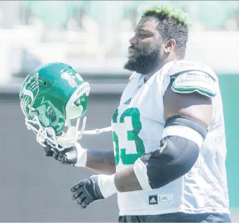  ?? MICHAEL BELL ?? Roughrider­s offensive tackle Derek Dennis is to face his former Calgary Stampeders teammates Saturday at McMahon Stadium.