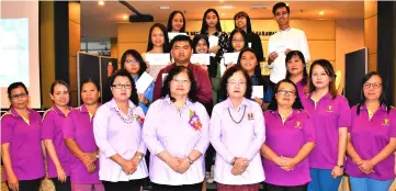  ??  ?? Alice (front fifth left), Uchi (front fourth left), and Nain (front fourth right) in a group photo with the incentive recipients.