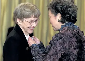  ?? OTTAWA CITIZEN FILE PHOTO ?? Dorothy Rungeling — Canada’s Flying Housewife — becomes a member of the Order of Canada, seen here in 2003 receiving the honour by then governor general Adrienne Clarkson.