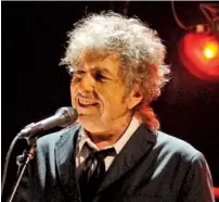  ?? AP PHOTO/CHRIS PIZZELLO ?? On Jan. 12, 2012, Bob Dylan performs in Los Angeles. The legendary singer/songwriter will bring his Rough and Rowdy Ways tour to the Tivoli Theatre on Monday.