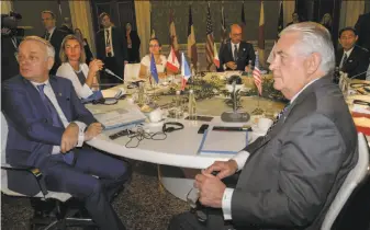  ?? Riccardo Dalle Luche / ANSA ?? U.S. Secretary of State Rex Tillerson (right) meets with his European counterpar­ts during a conference of foreign ministers of the G-7 in Lucca, Italy, ahead of Tillerson’s visit to Moscow.