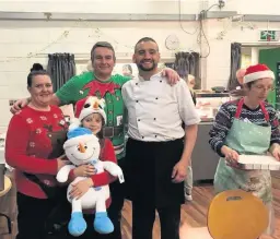  ??  ?? A group of volunteers will be preparing hundreds of Christmas dinners for people who are on their own in Swansea.