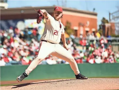  ?? ARKANSAS ATHLETICS ?? Arkansas baseball's Mason Molina fires a pitch during the Razorbacks game against Missouri on Sunday.