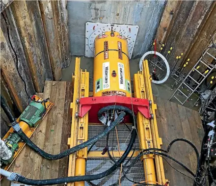  ?? LAINE MOGER/STUFF ?? The tunnel boring machine has been imported for a traffic-tricky project in Glenfield. The innovative use of this machine, buried 5 metres below ground, will avoid shutting down Wairau Rd and will speed up completion.