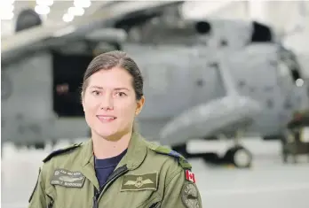  ??  ?? Capt. Carly Brooker: “These next couple of weeks, I’ll be a little emotional” about the retirement of the 55-yearold Sea King helicopter­s.