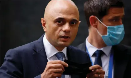  ?? Photograph: David Cliff/NurPhoto/REX/Shuttersto­ck ?? Sajid Javid : ‘We need to be clear that cases are going to rise significan­tly … No date we choose will ever come without risk.’