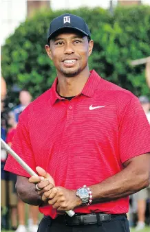  ?? JOHN AMIS/THE ASSOCIATED PRESS ?? Serving as a backdrop for the Ryder Cup matches beginning Friday in France is the buzz generated by Tiger Woods winning the Tour Championsh­ip on Sunday in Atlanta.