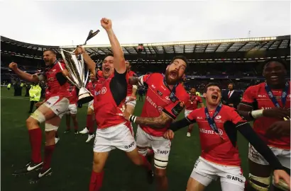  ?? Photograph: Getty ?? Saracens celebrate with the trophy after their European final victory in Edinburgh