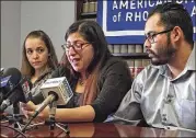  ?? MICHELLE R. SMITH / ASSOCIATED PRESS ?? Lilian Calderon (center), next to her husband, Luis Gordillo, cries at a February news conference at the ACLU’s office in Providence, R.I., as she describes her experience­s while in custody.