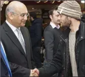  ??  ?? Welcome: Labour’s Keith Vaz greets one of the first Romanian arrivals on January 1
