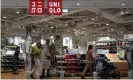  ?? Anadolu Agency/Getty ?? Shoppers at the Japan-based clothing company Uniqlo in Moscow, Russia. Photograph: