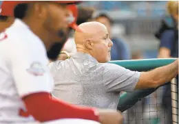  ?? JONATHAN NEWTON/THE WASHINGTON POST ?? Nationals GM Mike Rizzo walks the dugout prior to action against the St. Louis Cardinals at Nationals Park in September.