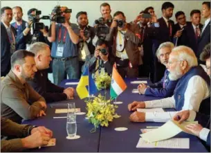  ?? ?? Ukraine’s President Volodymyr Zelensky attends a meeting with India’s Prime Minister Narendra Modi in Hiroshima, on the second day of the G7 Summit Leaders’ Meeting.