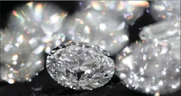  ?? MAXIM SHEMETOV Reuters ?? THIS WRITER estimates that the polished diamond price index is currently around the same level as in 2004. I