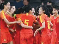  ?? (AFP) ?? China’s players celebrate a goal against Australia during the women’s Olympic football qualifier in Sydney, Australia, on Thursday.