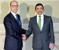  ?? AFP ?? Italian Foreign Minister Angelino Alfano shakes hands with Sheikh Abdullah bin Zayed Al Nahyan, UAE Minister of Foreign Affairs and Internatio­nal Cooperatio­n, at the G7 meeting in Italy. —