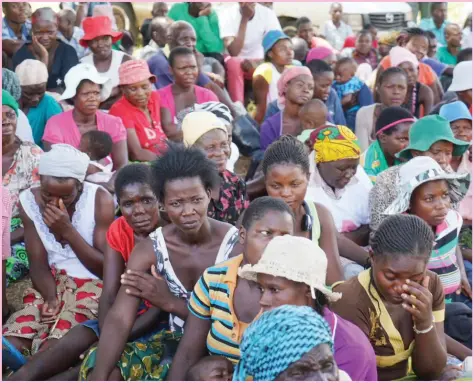  ??  ?? Some of the recipients of the United Nations Population Fund (UNFPA) dignity kits which comprised of sanitary pads, bar of soap, towel, underwear, comb, petroleum jelly, toothbrush and toothpaste, zambia wrap and a bag in which the items were placed