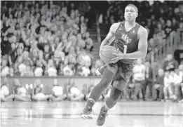  ?? JOHN MINCHILLO/AP ?? UCF guard B.J. Taylor has two home games left and is eager to win the next one against SMU on Sunday at CFE Arena.