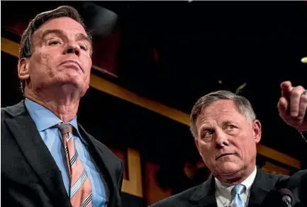  ?? WASHINGTON POST ?? Senate Intelligen­ce Committee vice chairman Mark Warner, left, and committee chairman Richard Burr, right, speak during a news conference on Capitol Hill.