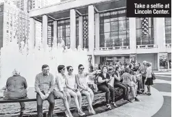  ?? ?? Take a selfie at Lincoln Center.