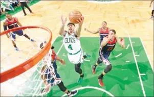  ?? AFP ?? Isaiah Thomas the Celtics goes for a layup against the Washington Wizards in Game 2 of the Eastern Conference semifinals on Tuesday.