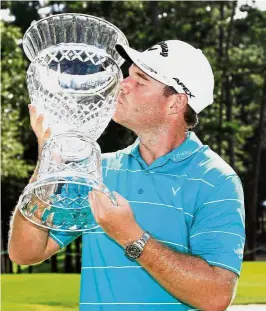  ??  ?? Maiden title: Grayson Murray of the United States celebrates after winning on the 18th green during the final round of the Barbasol Championsh­ip at the Robert Trent Jones Golf Trail in Auburn, Alabama, on Sunday. – AFP