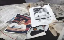  ?? STEVE MARCUS ?? A photo of Xavier Crockett and a pamphlet from his funeral service are displayed Feb. 13 in Debra Simms’ apartment. Crockett, then 15, and friend Jason Moore were killed in 1996. Nearly 25 years after the two were killed, a man has confessed to the slayings, North Las Vegas Police report.