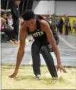  ?? PETE BANNAN — DIGITAL FIRST MEDIA ?? Strath Haven’s Dayo Abeeb, seen here competing during the indoor season, took first in the long and triple jumps at the Central League Track and Field Championsh­ips at Lower Merion High School.